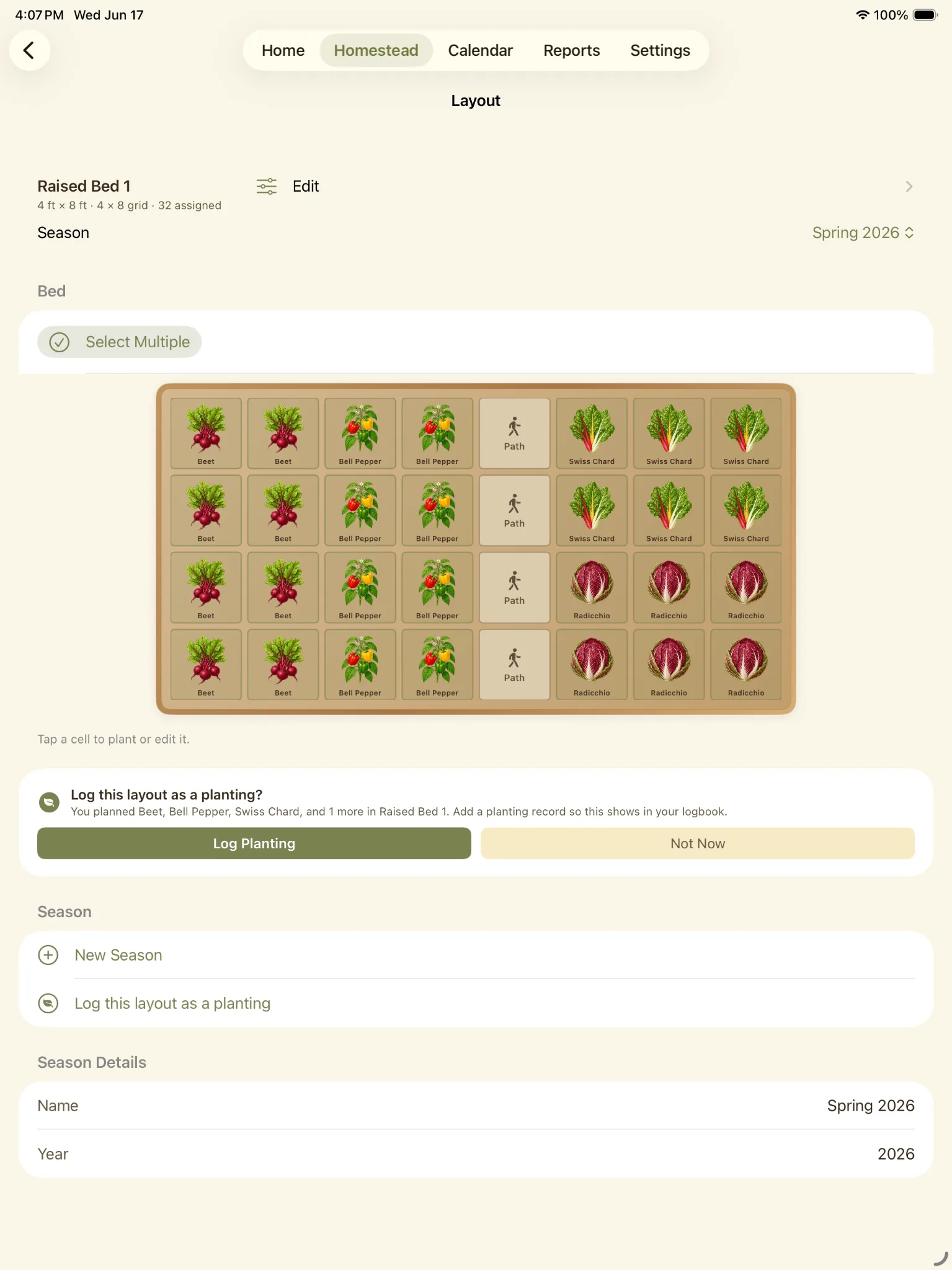Garden bed layout with crops assigned to a grid and a prompt to log the layout as planting.